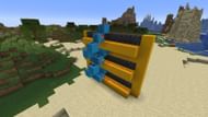 The spiral staircase, complete with redstone dust leading from top to bottom (Image via Mojang)
